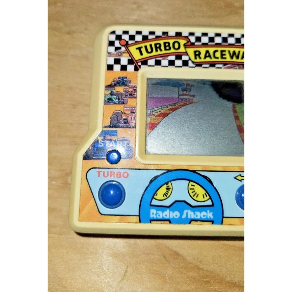 VINTAGE ELECTRONIC HANDHELD TURBO RACEWAY GAME RADIO SHACK TESTED + WORKS